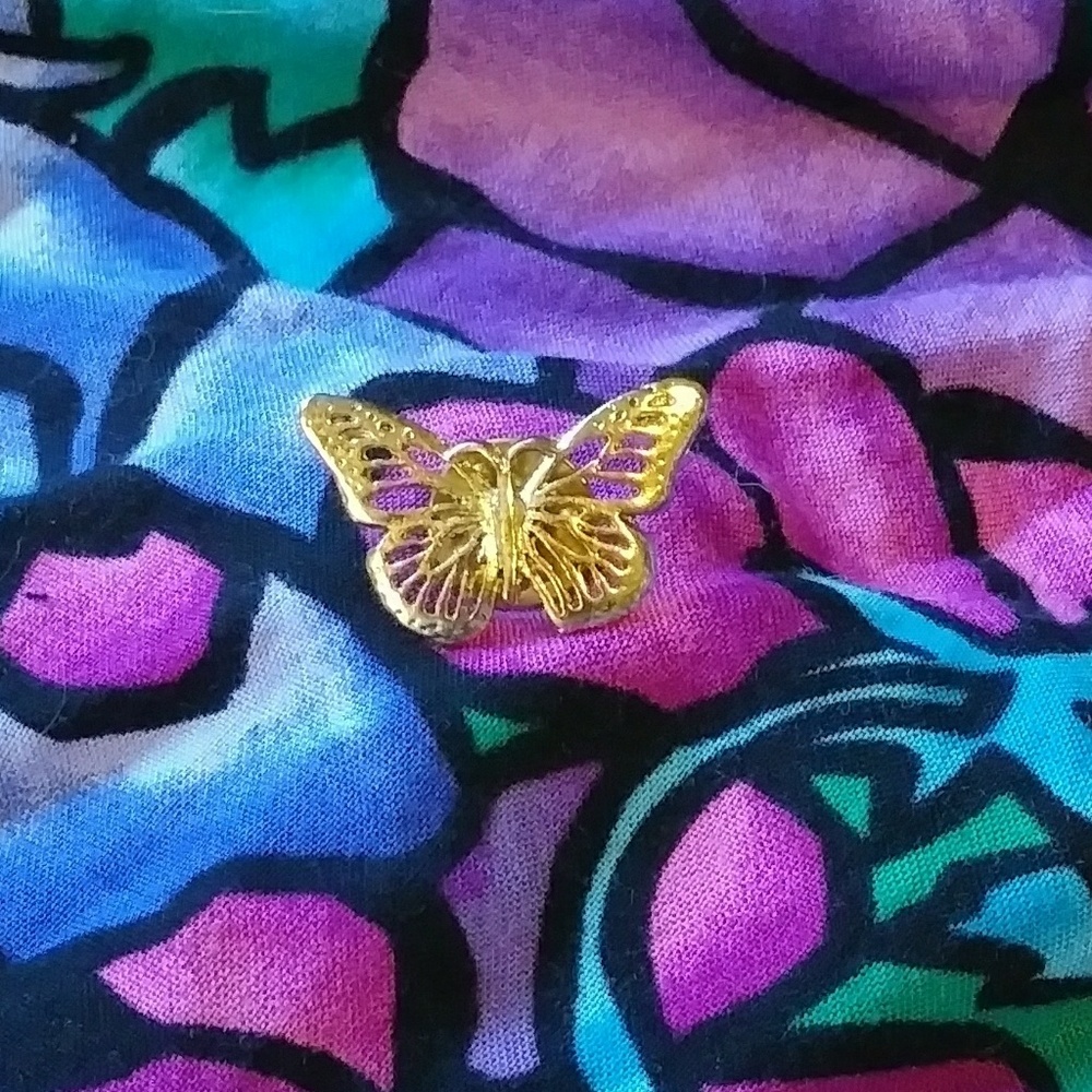 Goldtone butterfly pin